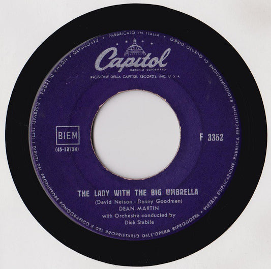 The Lady With The Big Umbrella